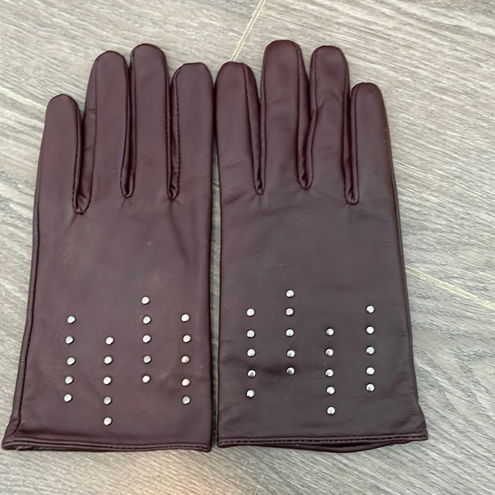 Faux leather gloves, just used them once probably. Seems like new.